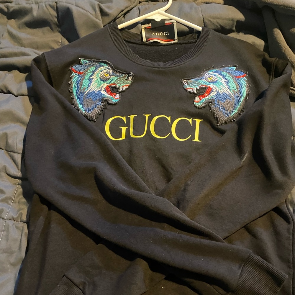 Gucci wolf sweater.